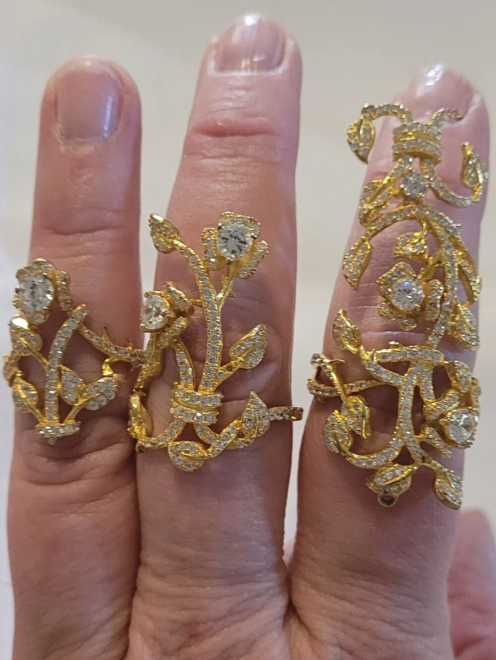 Three Ornate Gold Plated Sterling Silver Rings Set